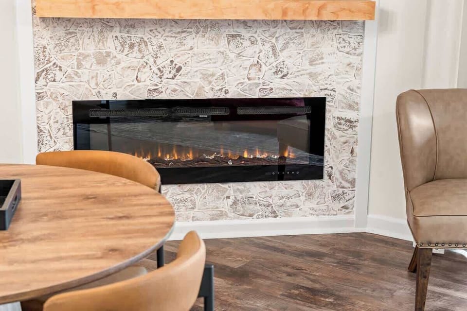 Electric fireplace with several light plus heat settings