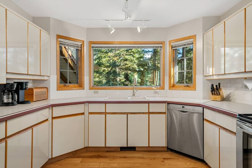 Full kitchen with a drip coffee maker, blender, ground coffee, tea, sugar and basic condiments (ketchup, mustard, relish.)