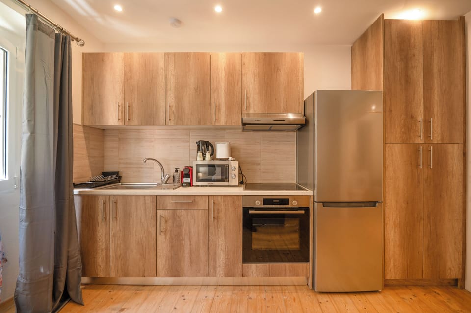 Comfort Apartment, City View | Private kitchen | Electric kettle
