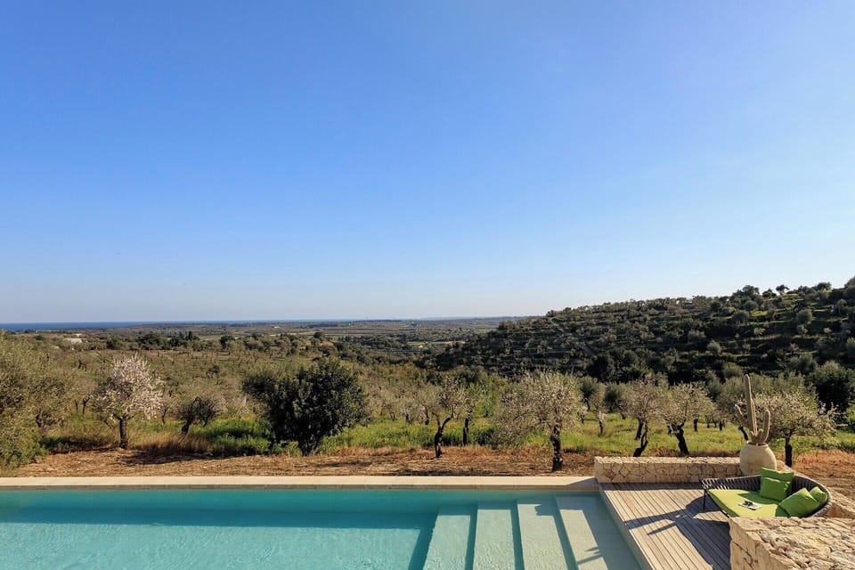 The beautiful pool and the views out to sea.