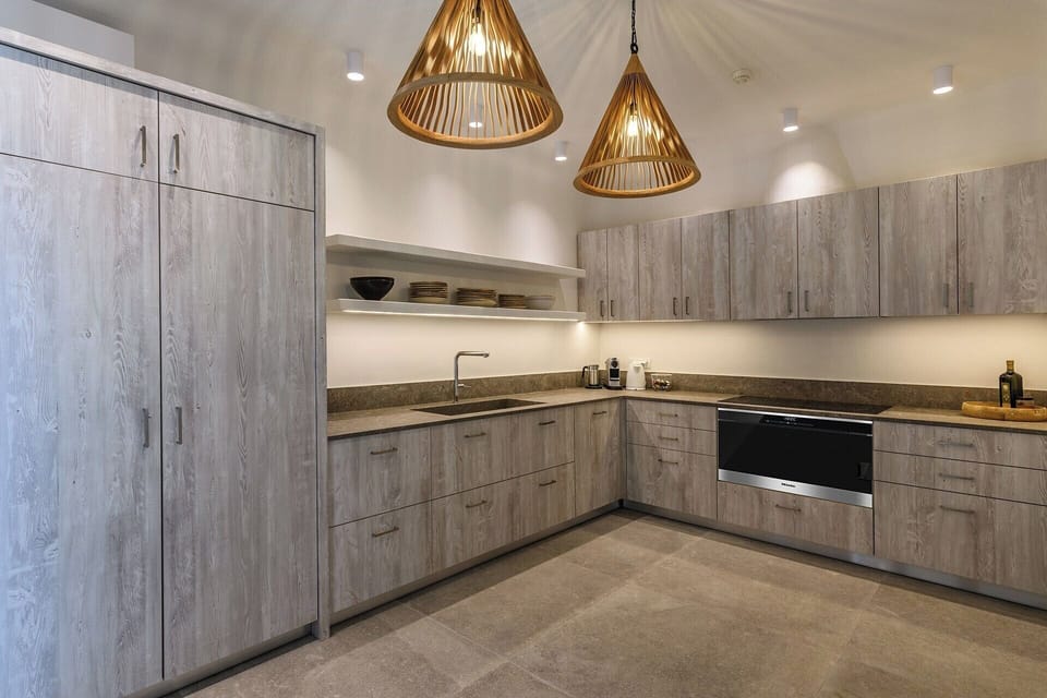 The sleek, stylish contemporary kitchen.