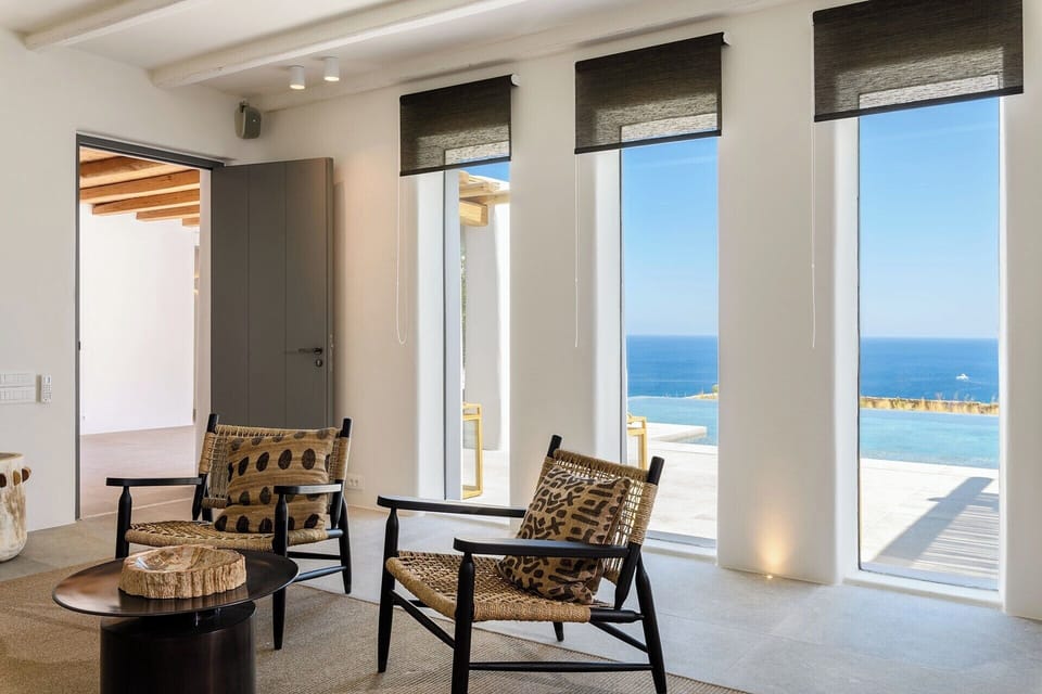 A triptych of windows in the living area offers tantalising views out to sea.