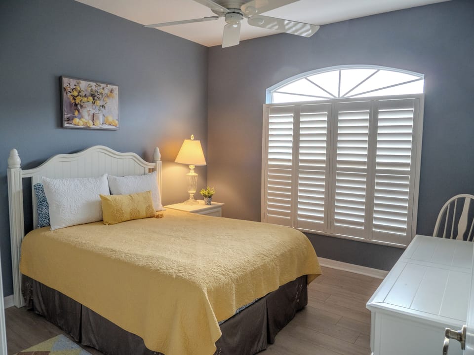 Guest bedroom with queen bed.