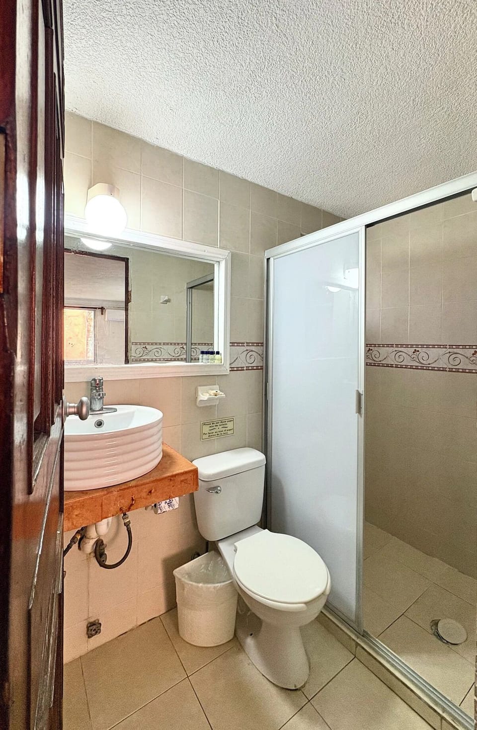Refresh after adventures in a bright, spotless private shower.