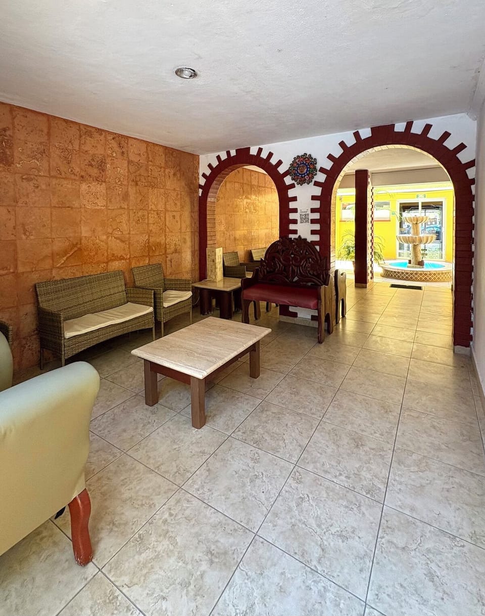 Wander through charming arches toward tranquil courtyard moments.