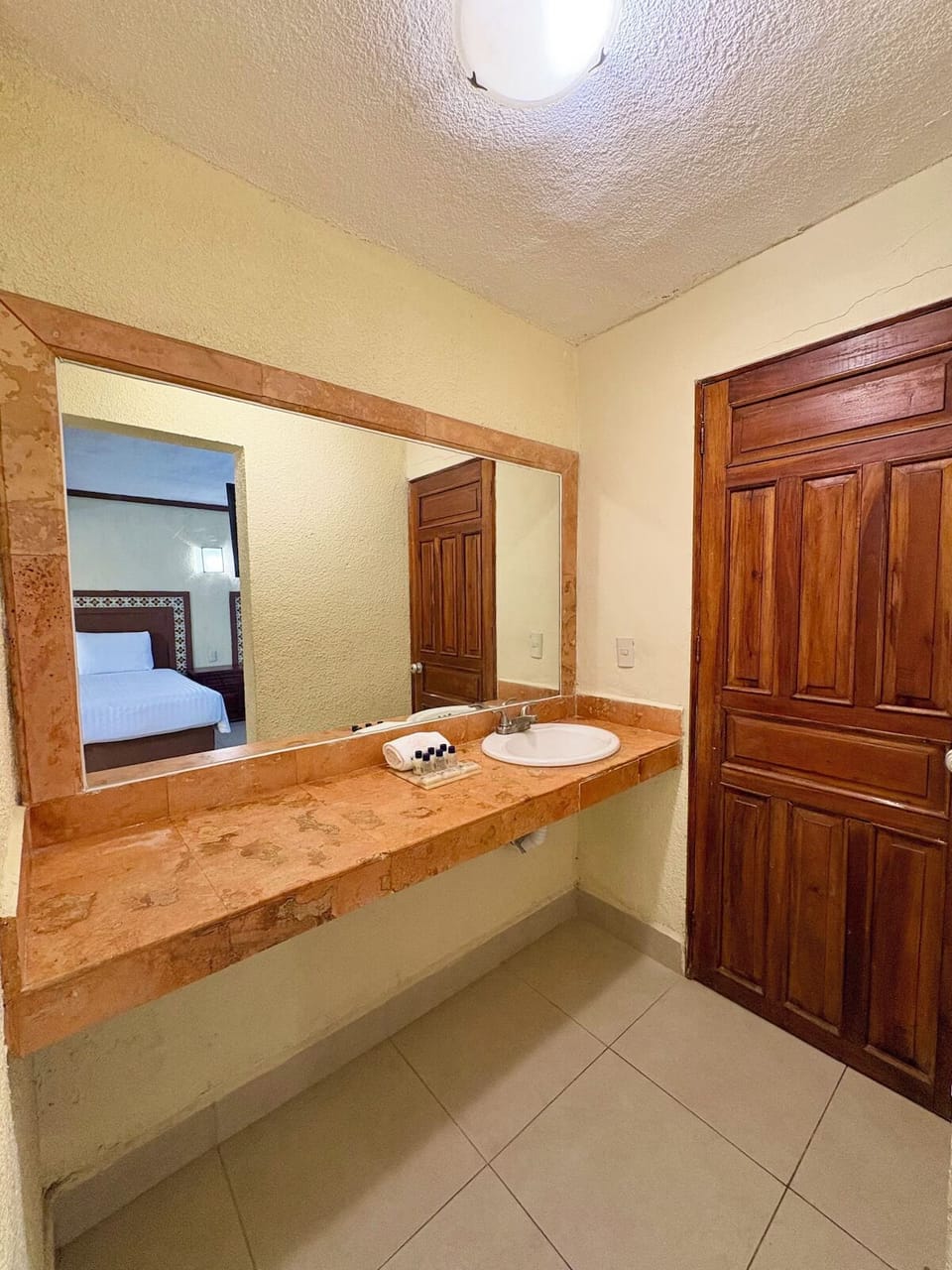 Get ready with plenty of counter space and warm lighting.