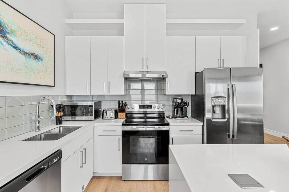 Cook with ease in this spacious, well-equipped kitchen featuring modern appliances.