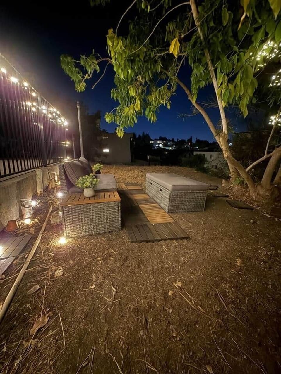 Enjoy a quiet evening under the twinkle of warm string lights.