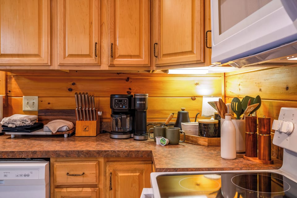 Additional small appliances not pictured — blender, bread toaster, and mixer.