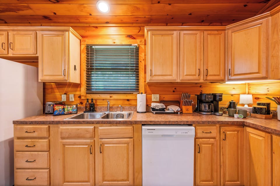 Well-stocked kitchen featuring all essentials plus multiple seasoning options