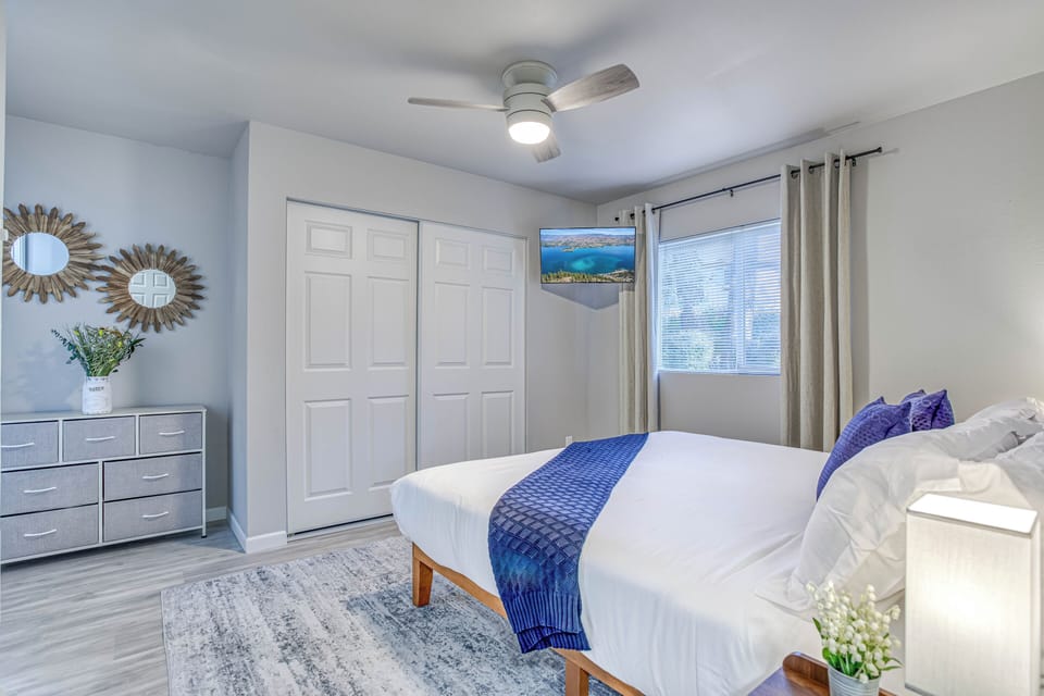 Master bedroom with King size bed and Smart TV.  Also includes private full bath