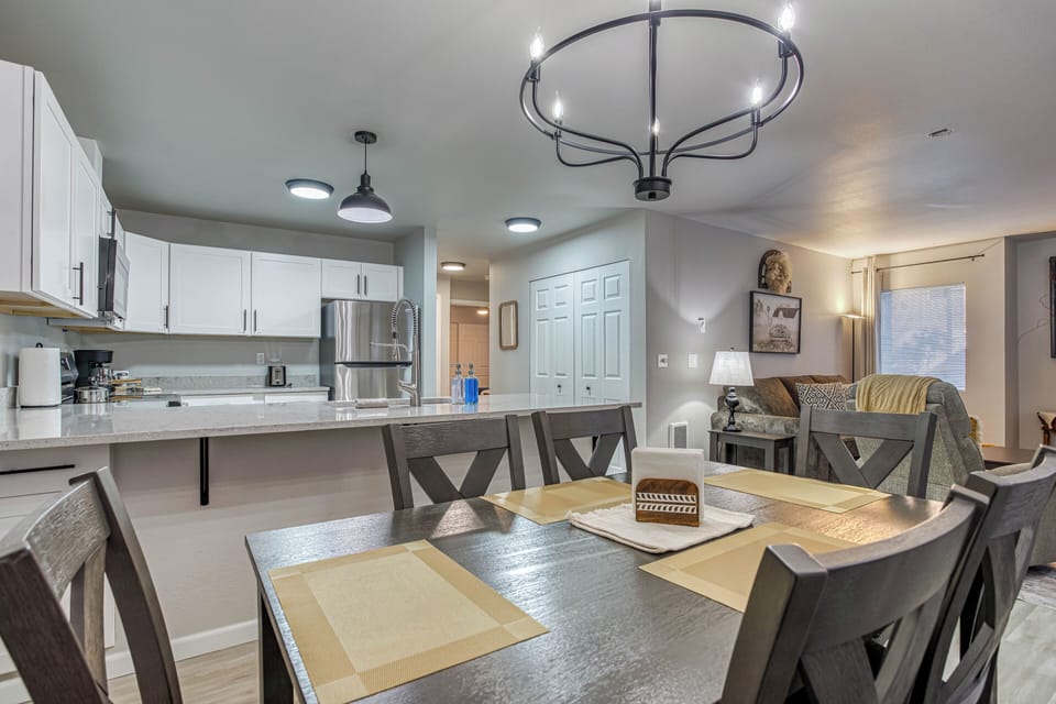 Dining room in open concept kitchen and living spaces.