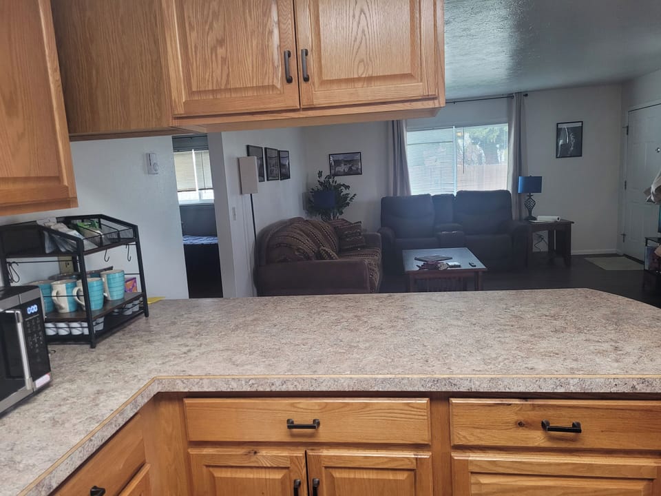 Kitchen looking into living room