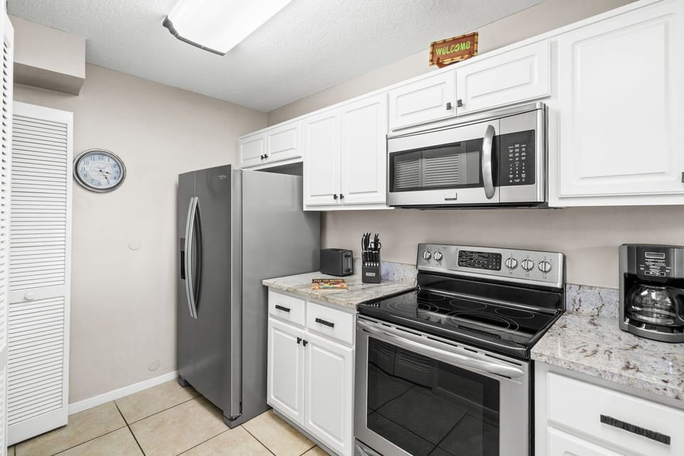 Fully Stocked Kitchen with Bar Area
