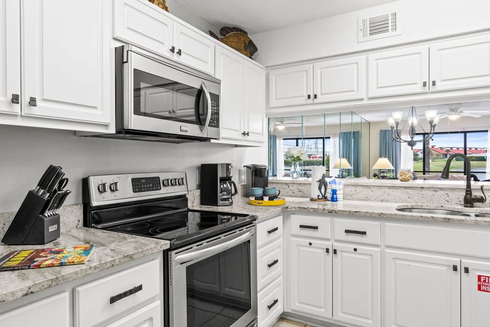 Fully Stocked Kitchen with Bar Area