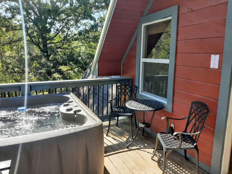 Sit out with coffee and enjoy the view of the woods all around.