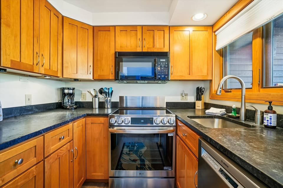 Well-equipped kitchen with modern appliances and plenty of counter space for preparing meals during your stay.