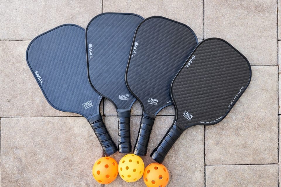 Pickleball gear included—four paddles & balls for court-side fun