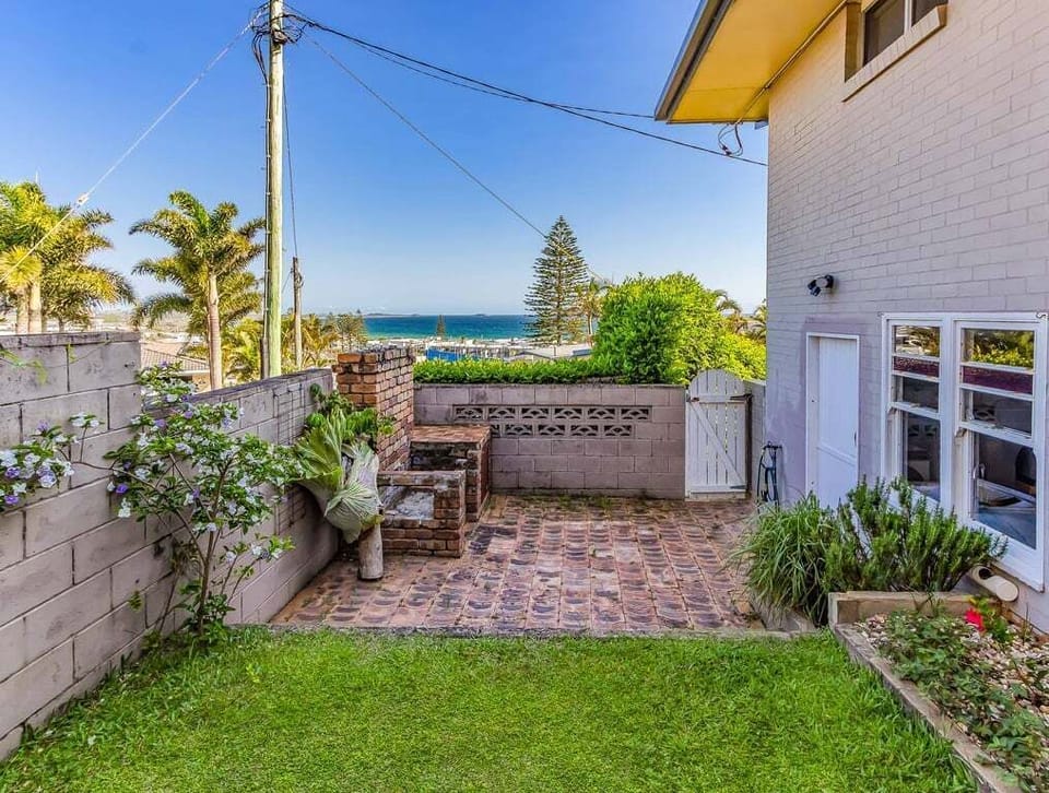 Ocean views from grassy backyard