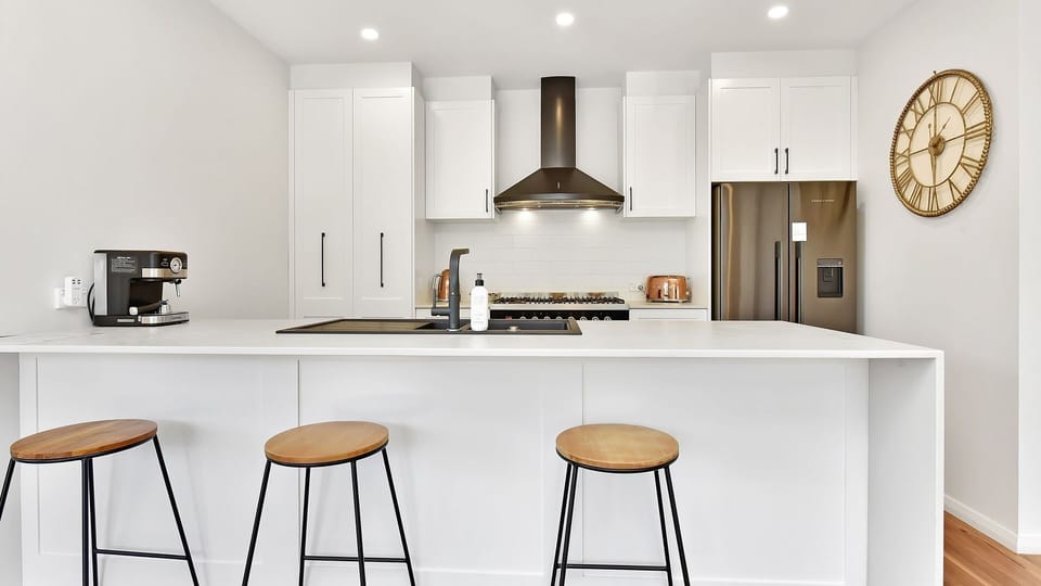 Modern kitchen with breakfast bar seating
