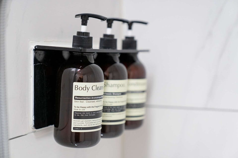 Premium Studio Suite | Bathroom | Hair dryer, slippers, heated floors, towels