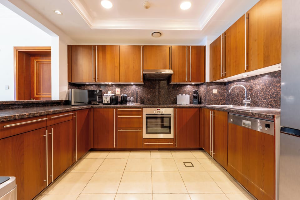 Deluxe Apartment, Balcony, Sea View | Private kitchen | Espresso maker, electric kettle