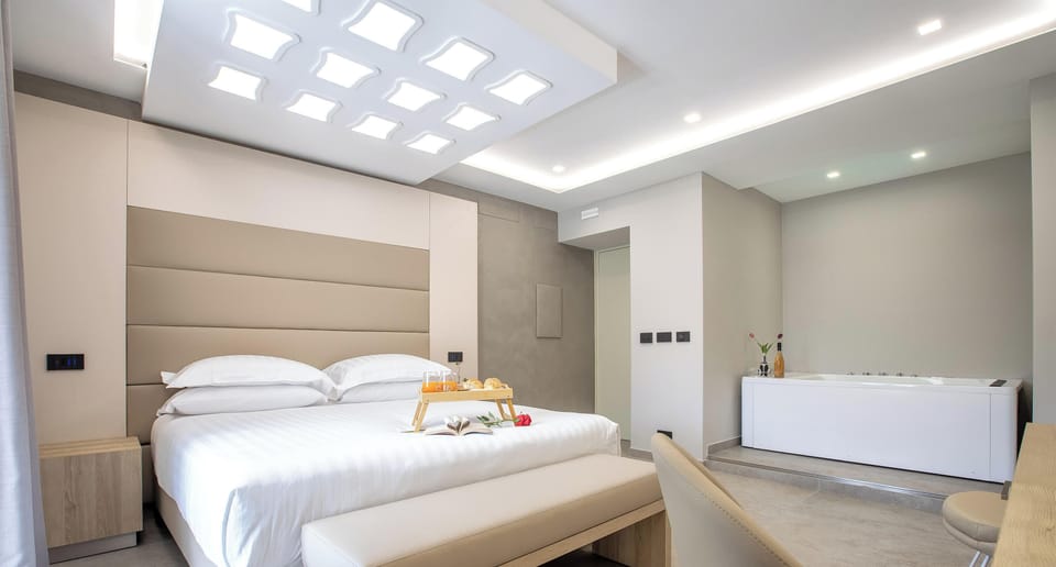 Deluxe Double Room, Jetted Tub | Premium bedding, down comforters, minibar, in-room safe