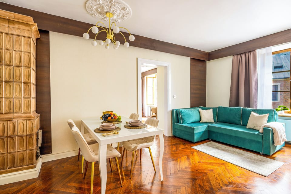 Superior Suite, City View | Living area | Flat-screen TV, fireplace