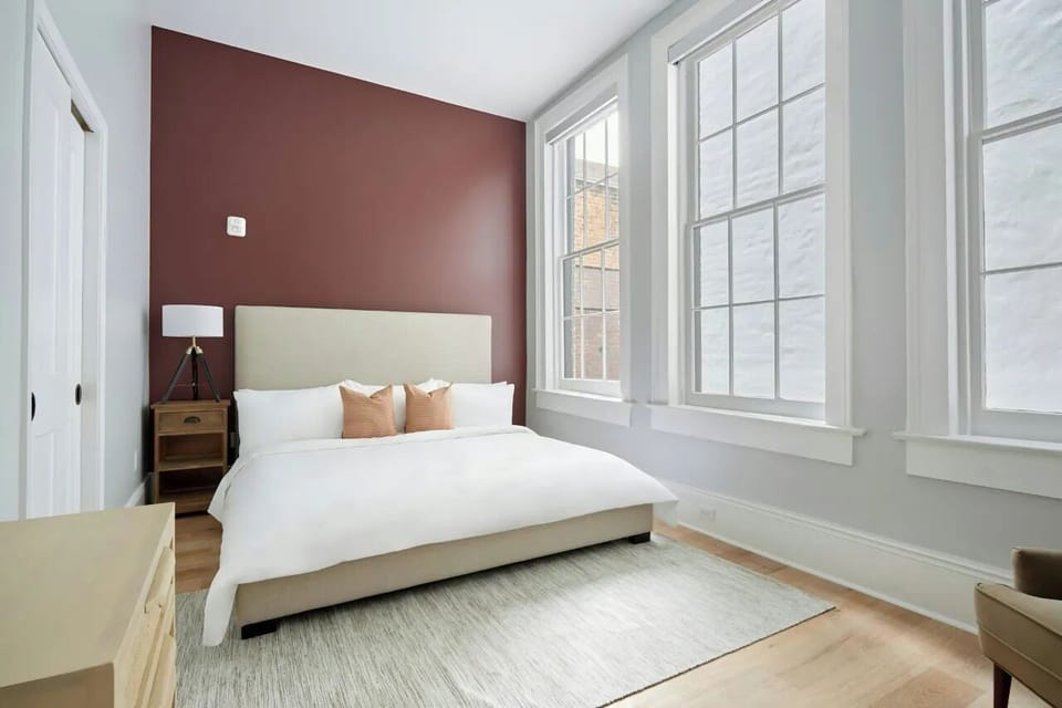 Bedroom 1 features a queen bed.