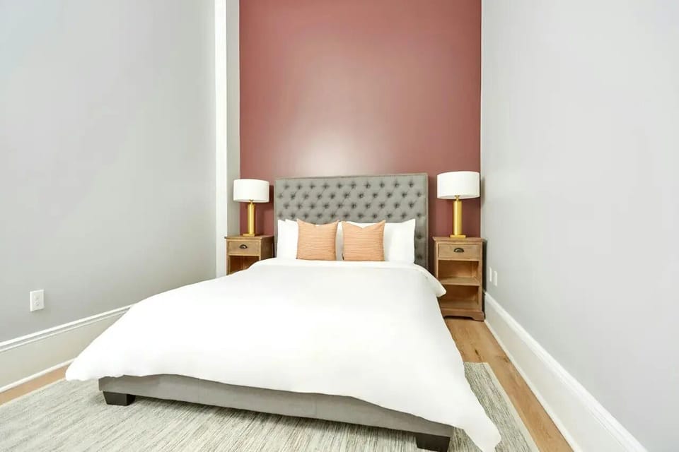 Bedroom 1 features a queen bed.