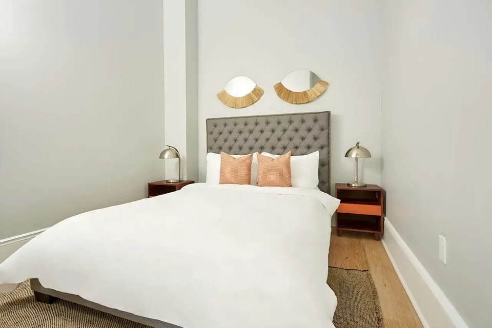 Bedroom 2 features a queen bed.