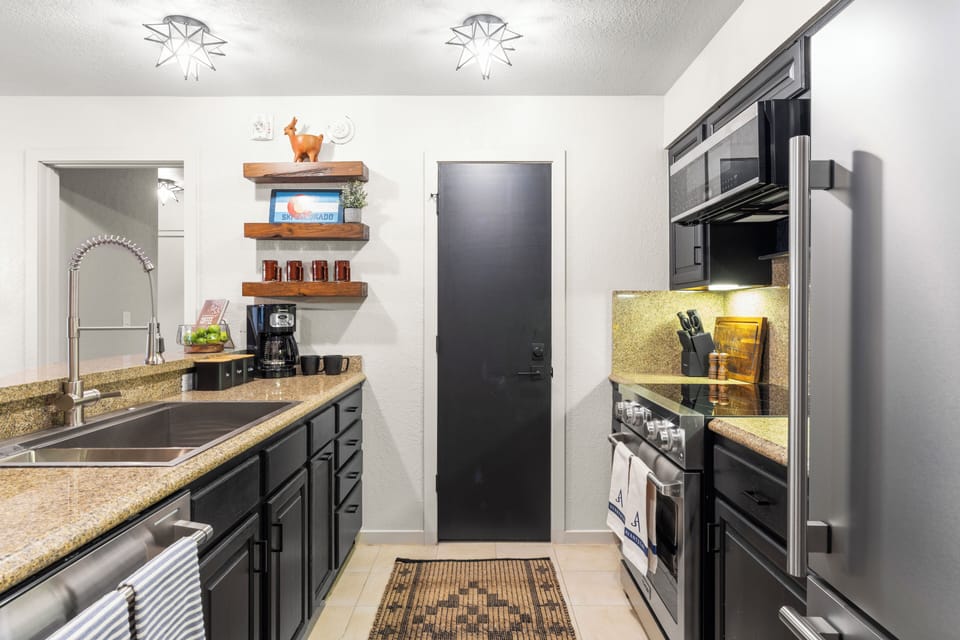 Fully stocked kitchen with reliable appliances and utensils.