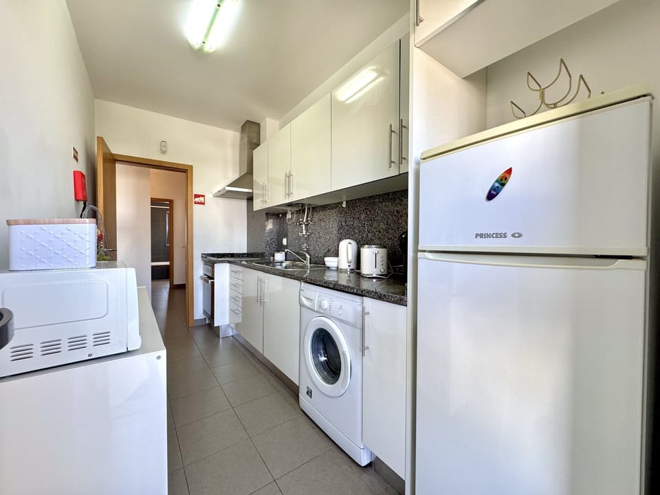 Microwave, coffee/tea maker, cookware/dishes/utensils