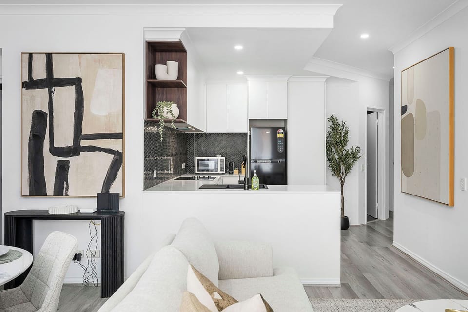 Bright and stylish kitchen area perfect for cooking and dining.