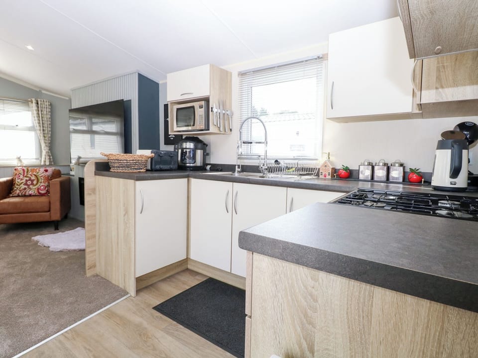 Fridge, microwave, toaster, cookware/dishes/utensils