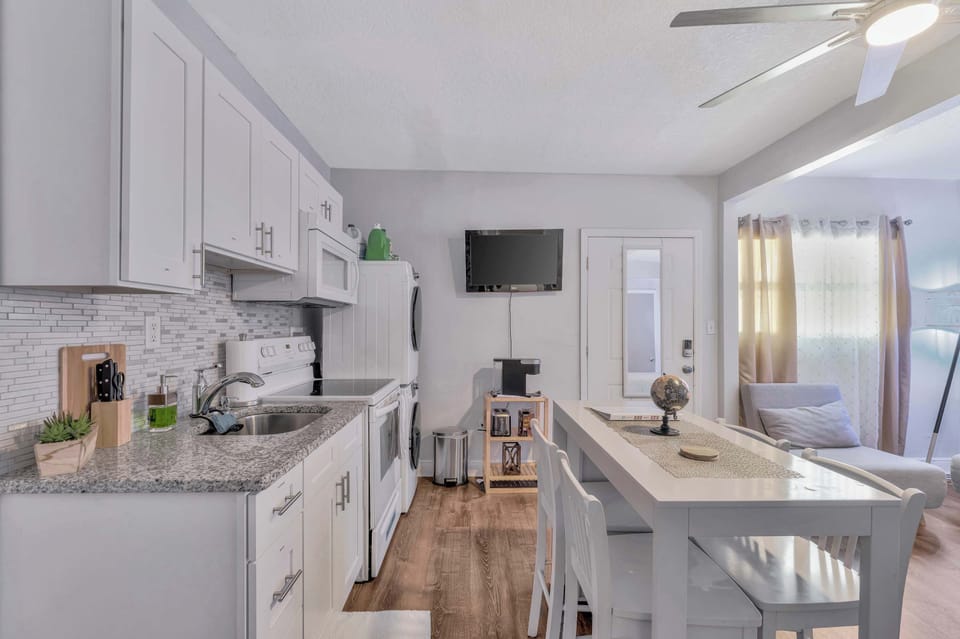 Cook, dine, and relax without missing a beat in this open layout.