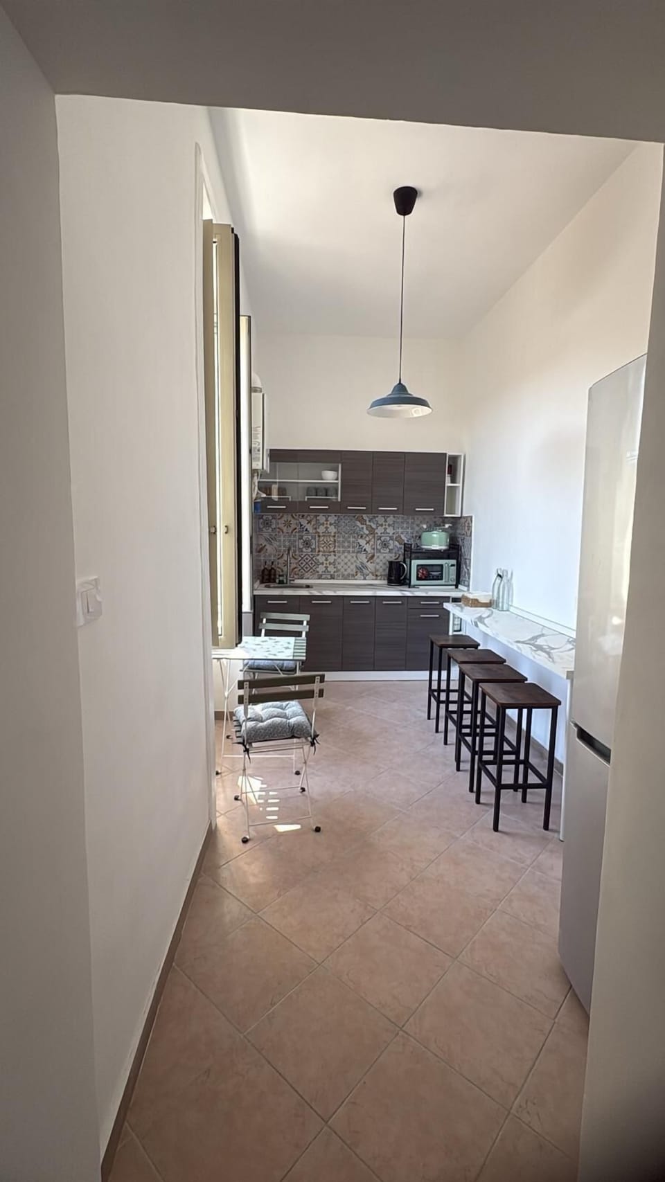 Shared fridge, microwave, espresso maker, coffee/tea maker