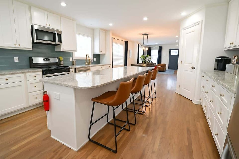 Spacious kitchen with breakfast bar and abundant storage throughout
