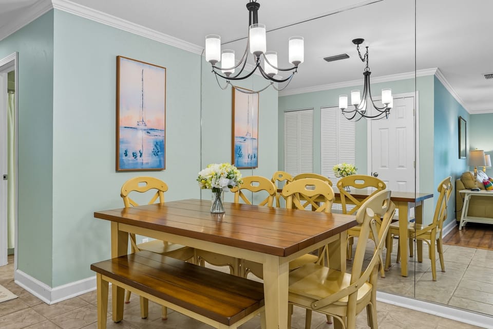 Dining Room with Seating for Six - Coastal lighting, artwork, and table seating make meals easy without leaving the condo.