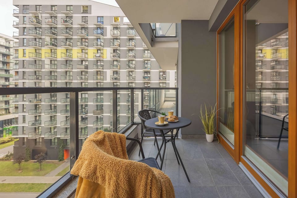 Relaxing balcony setup perfect for a morning coffee.
