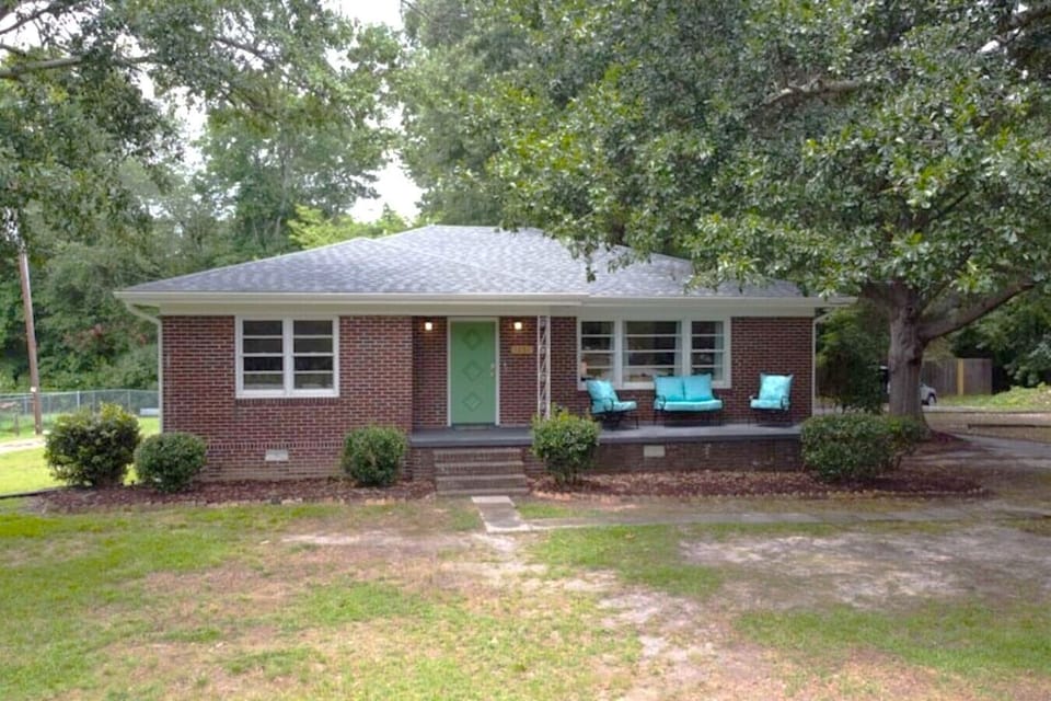 Welcome to Mutts on Miller! Close to Greenville shops and restaurants, this pet-friendly home features a large fenced yard, ample parking, and space for boats or trailers—perfect for travelers bringing furry friends along.