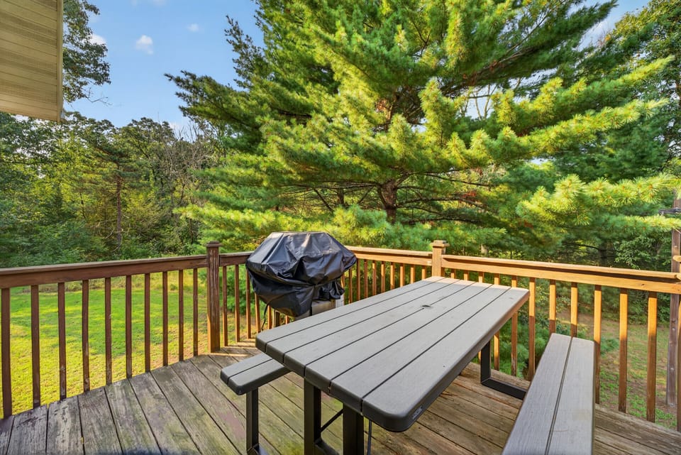 Picture yourself dining al fresco on your private deck, surrounded by towering pines and peaceful greenery. Fire up the grill for an unforgettable outdoor meal in your own tranquil retreat.