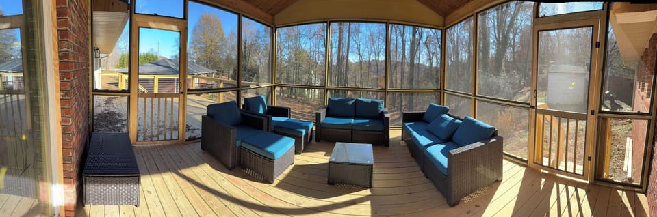 Enjoy your family and friends or a cup of coffee on this amazing screened porch!