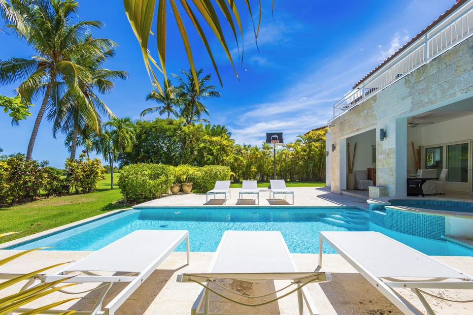Unwind by your private palm-lined pool.