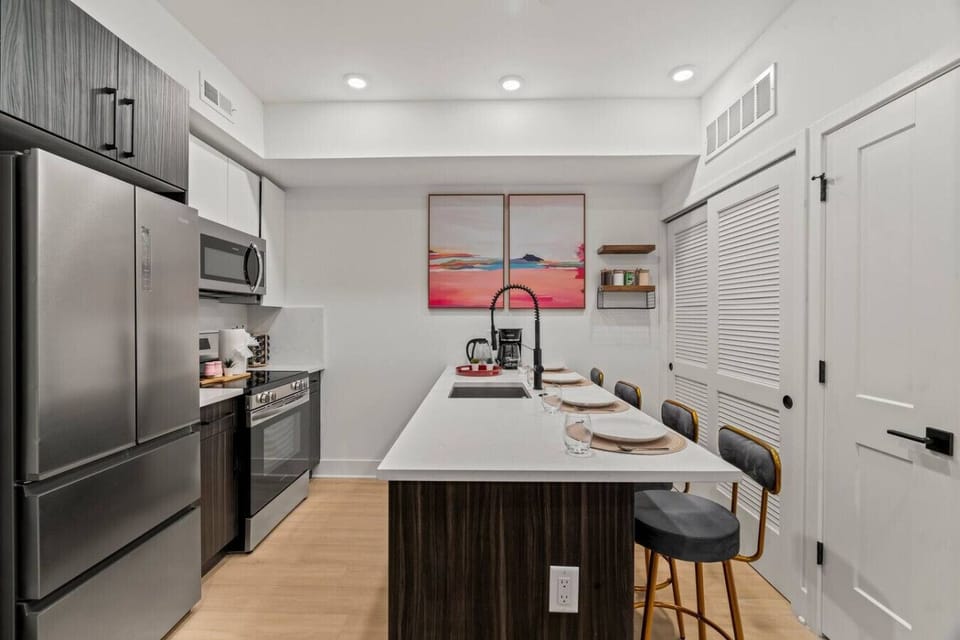 Breakfast bar/dining area in the kitchen that comfortably sits 4 people.
