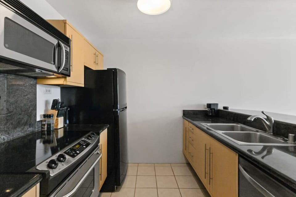 Everything you need, right where you need it in this sleek kitchen.