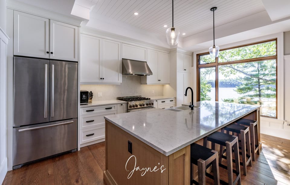 Modern kitchen with spacious island and garden views
