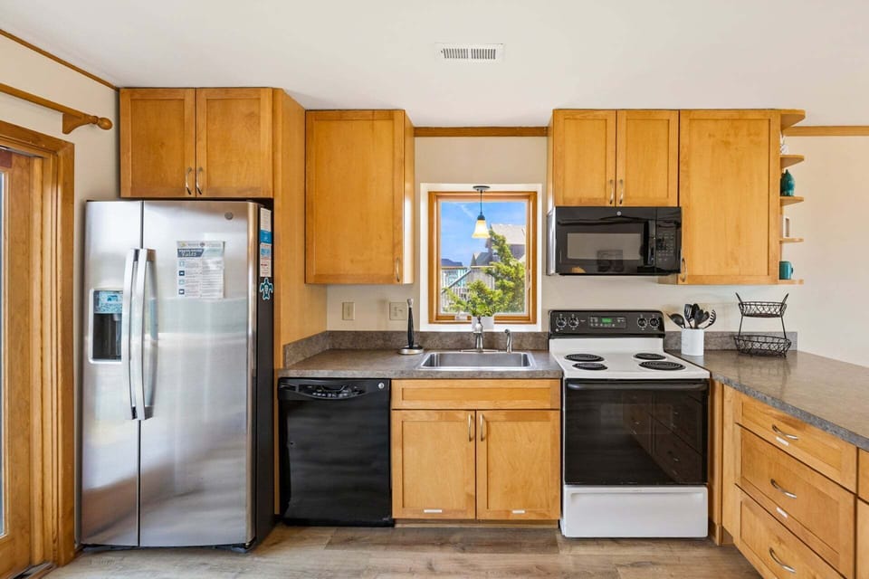 Fully Equipped Kitchen with modern appliances and everything you need for easy vacation cooking.