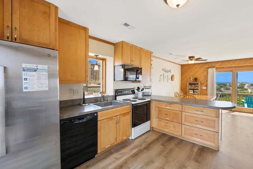 Fully Equipped Kitchen with modern appliances and everything you need for easy vacation cooking.