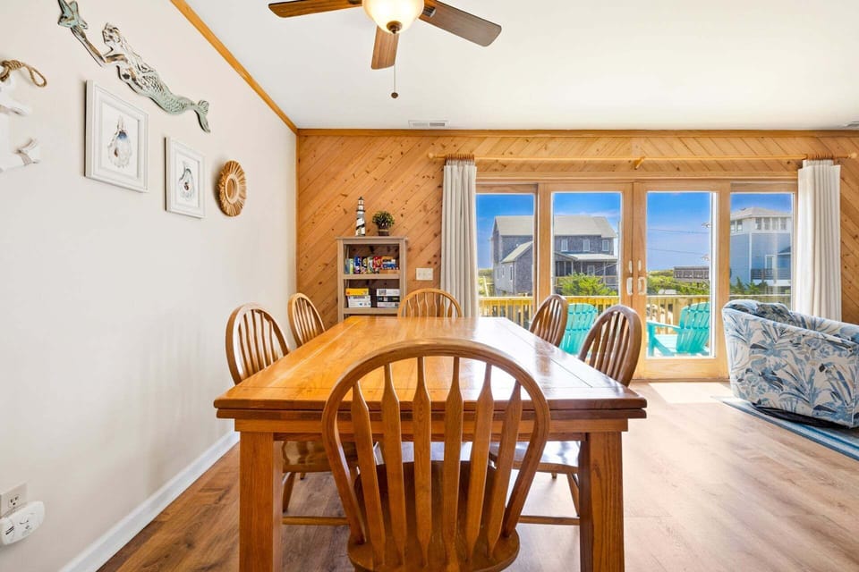 Dining Area with a View — enjoy meals with family surrounded by beachy charm.